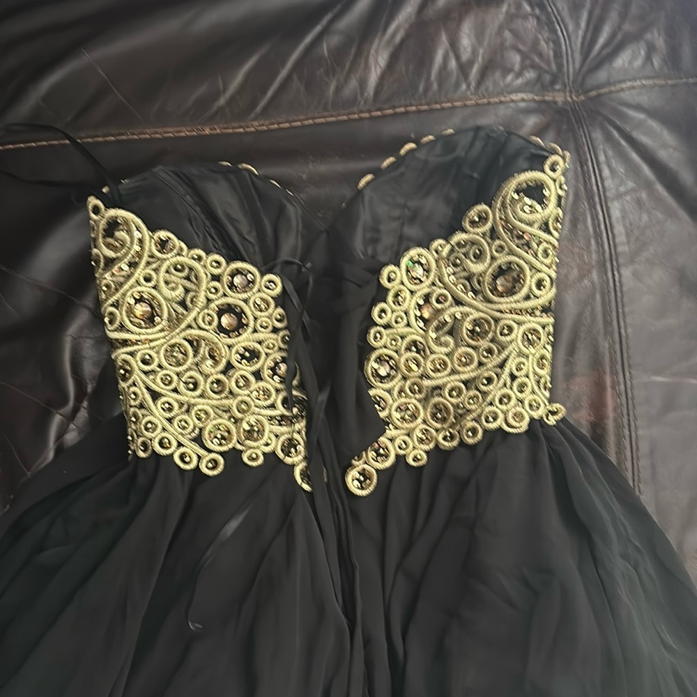 Women’s black n gold party dress